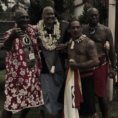 The Ali'i Nui standing with Tahitian chiefs in traditional attire
